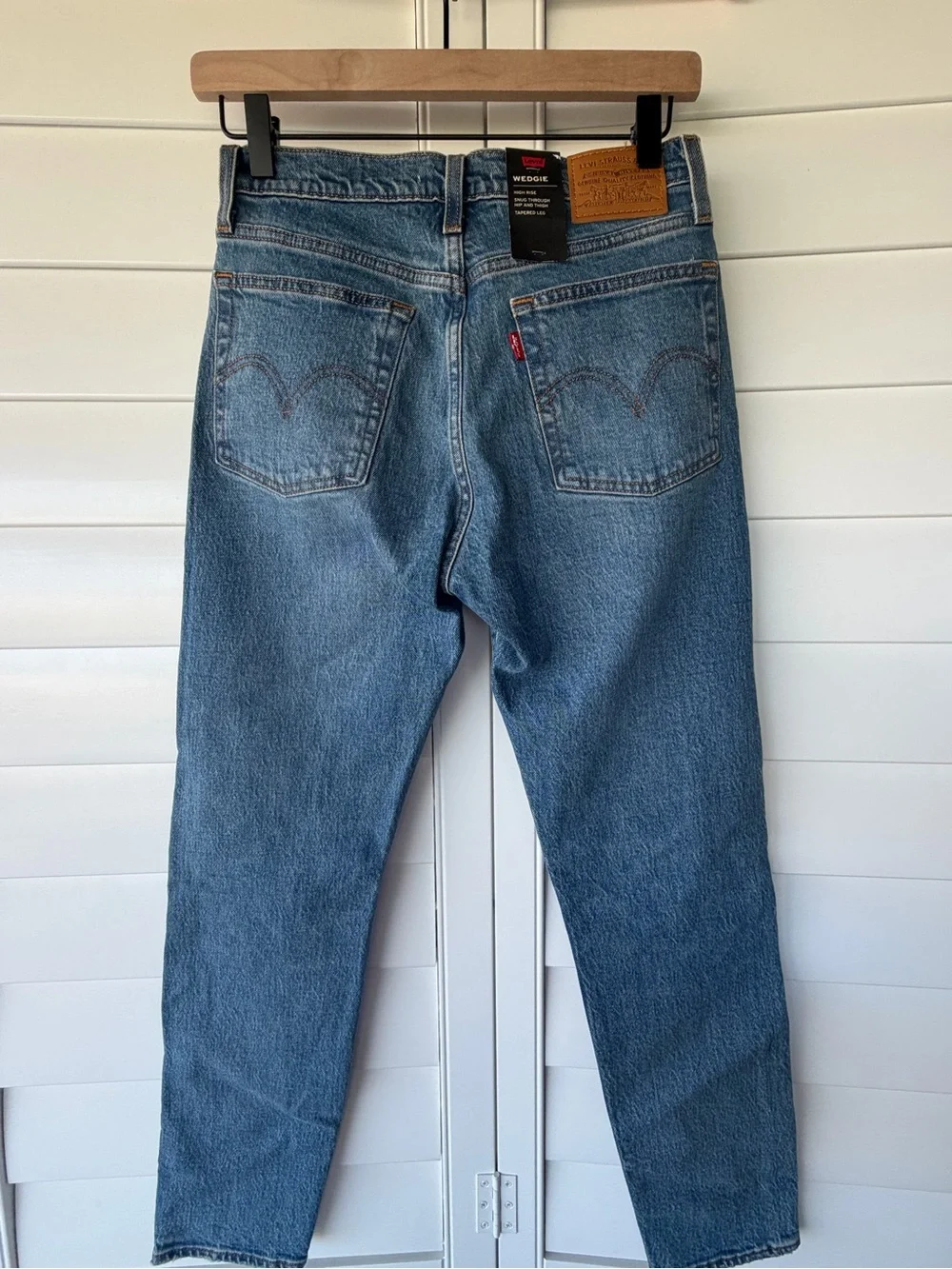 Levi's light blue Wedgie high-rise tapered jeans